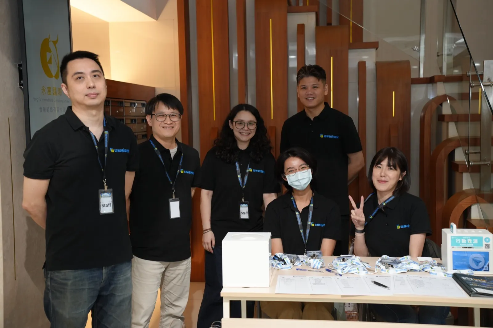 The GoWarehouse team at the check-in desk